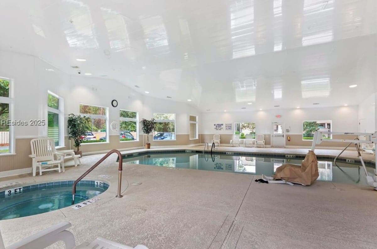 Indoor heated pool with hot tub and skylights — open year-round